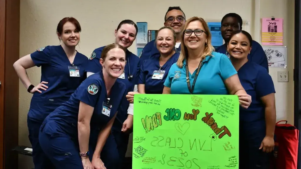 LVN class of 2023 posing together with a poster